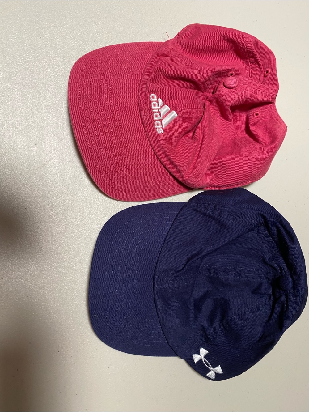 2 for 19 NWOT Adidas pink & Under Armour navy logo baseball caps - set of 2